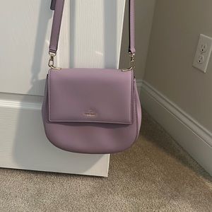 Brand new Kate spade limited edition purple. Never used